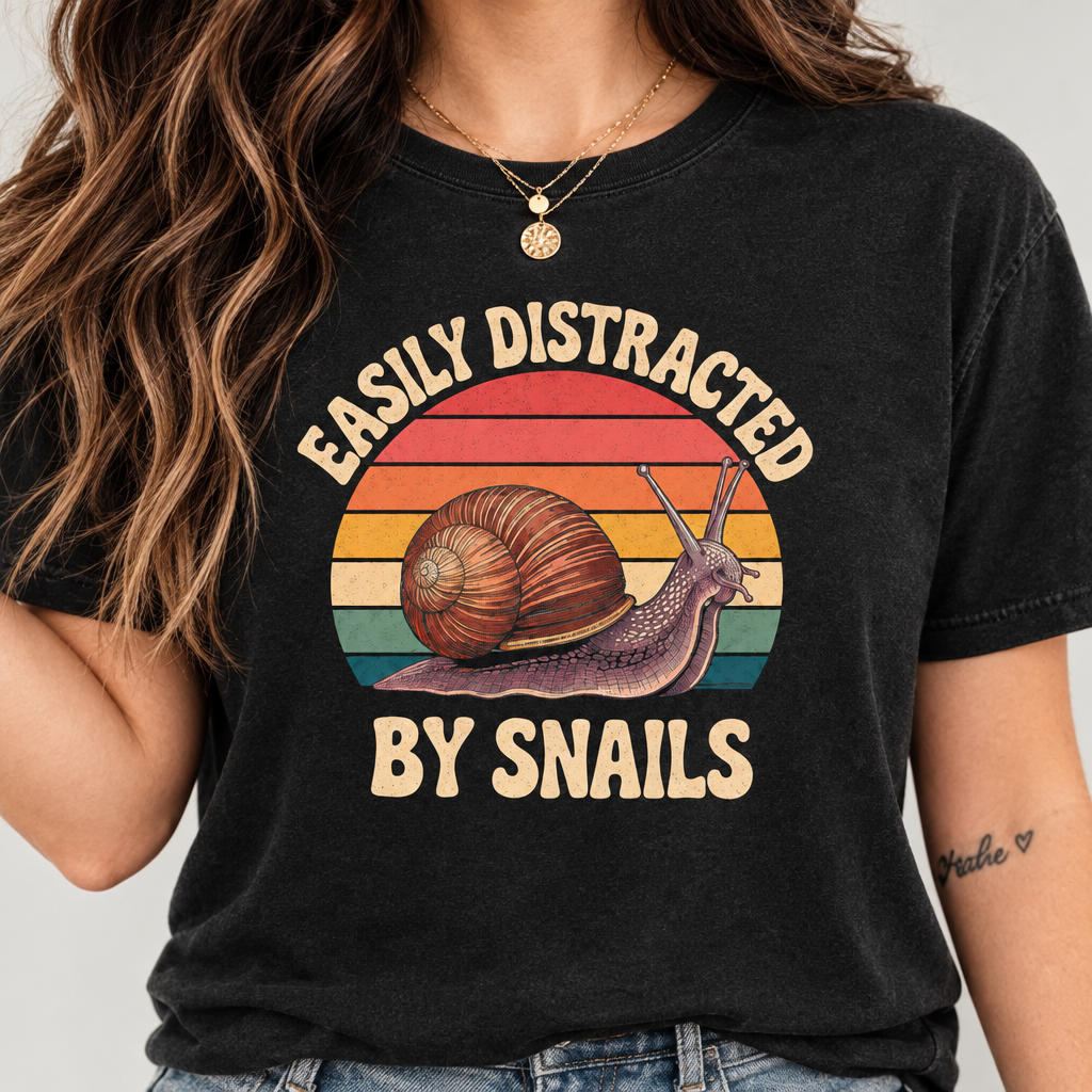 Model wearing the snail design on a black shirt