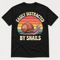Snail artwork printed on a black shirt